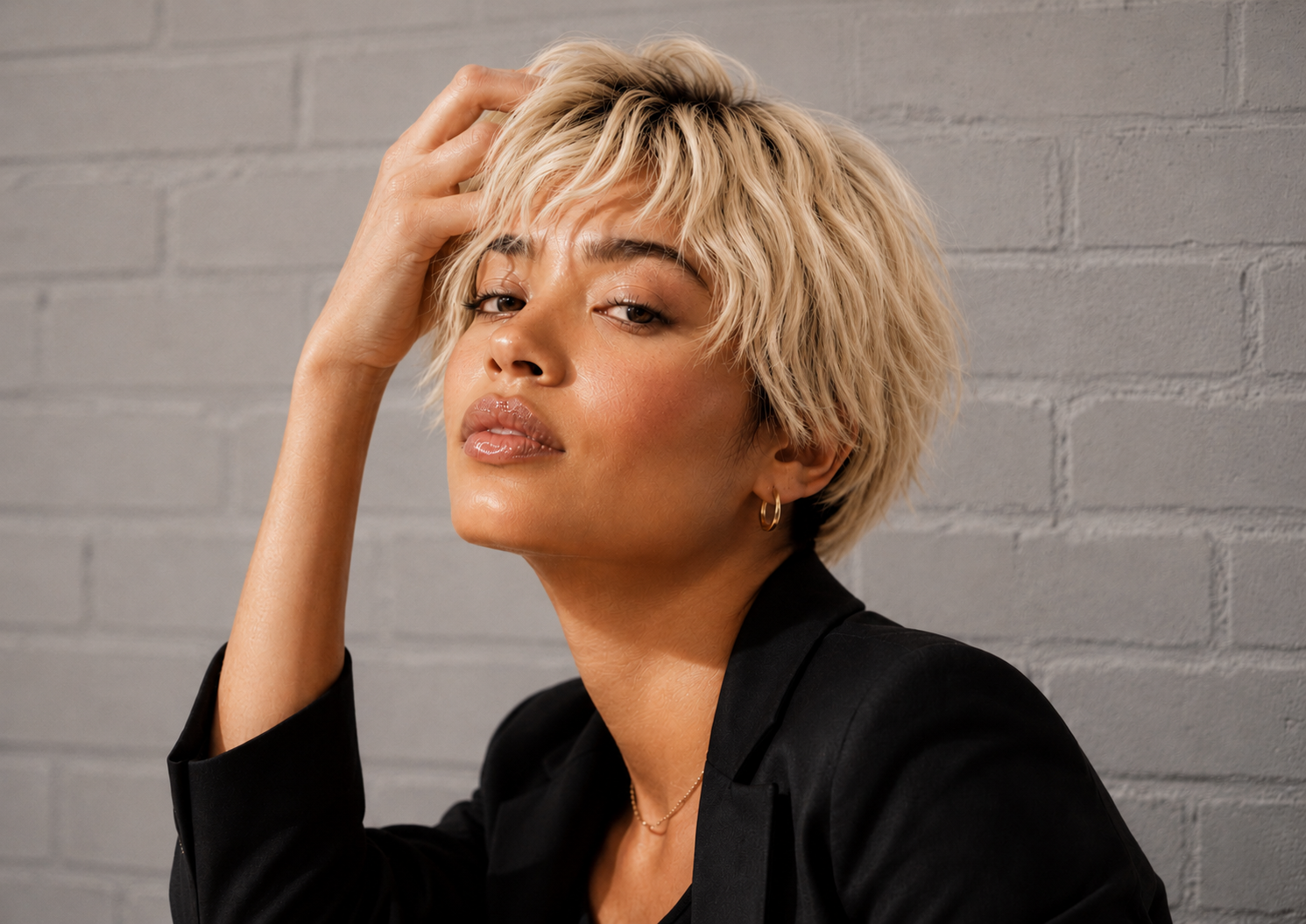 image of woman with short blond highlighted hair 