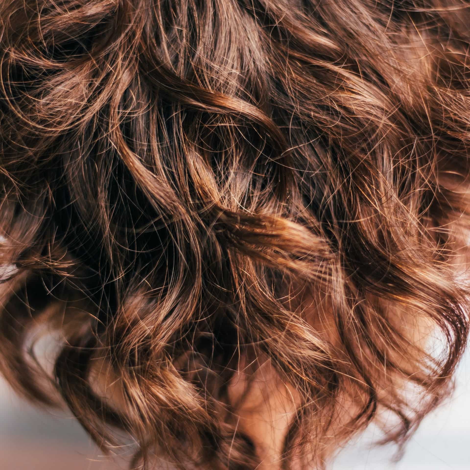 a woman with healthy, moisturized hair