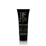 A black tube of Giovanni Cosmetics PROFESSIONAL STRONG HOLD HAIR STYLING GEL with Silk Extract, Keratin & Rice Milk stands upright on a white background. The labeling highlights salon-quality styling gel with long-lasting hold and natural ingredients.