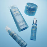 Biotin & Collagen Leave-In Conditioner, Elixir, Oil and Mask floating in beautiful blue background with ambient lighting.