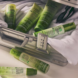 Image of complete 2chic Ultra Moist hair care collection in hard-sided travel bag.