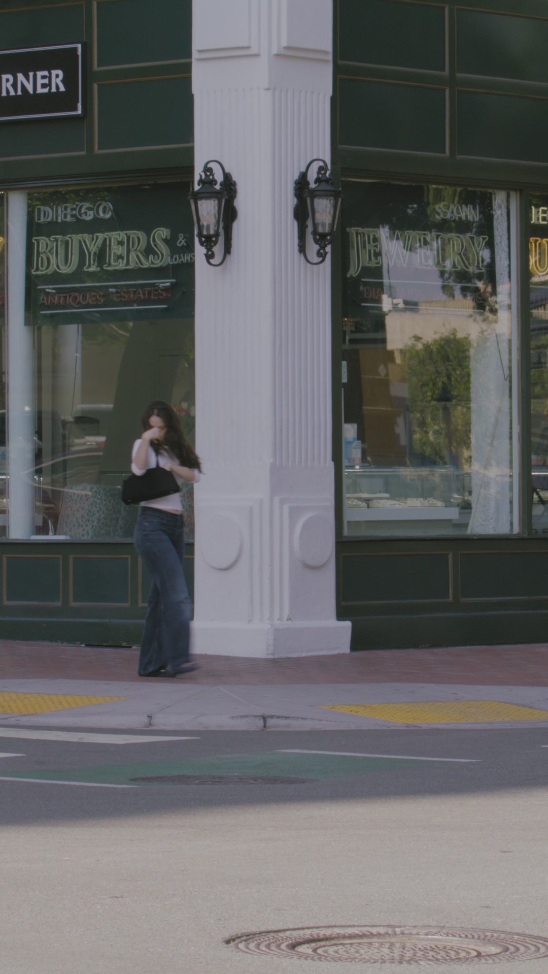 Video showing woman on busy sidewalk reaching for Giovanni's Ultra Moist Super Potion Serum for a quick hair fix. 