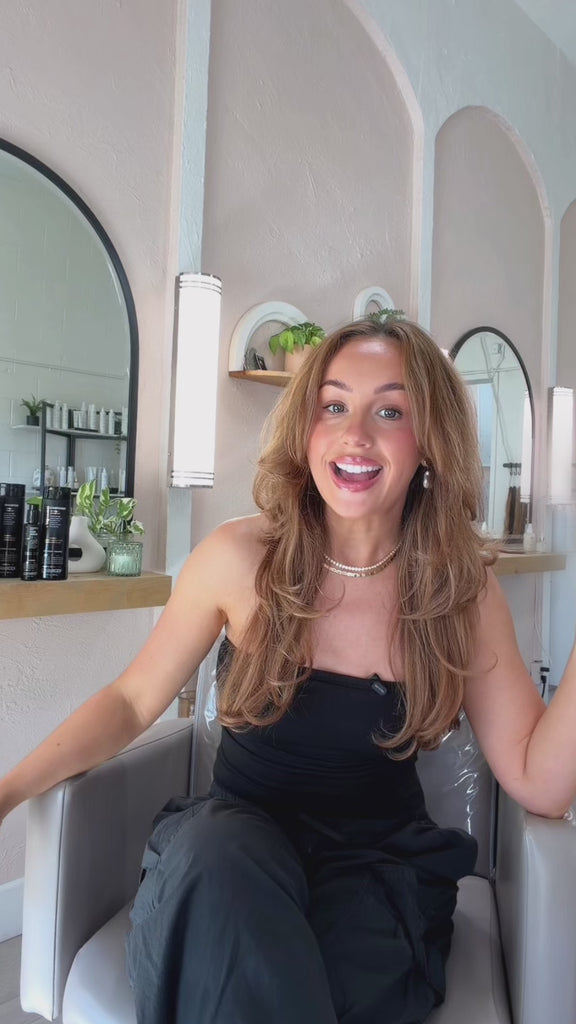 Video of salon customer in salon chair sharing Giovanni Professional Collection.
